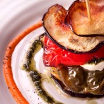 Provencals Stack of grilled vegetables, fresh mozzarella and pepper coulis